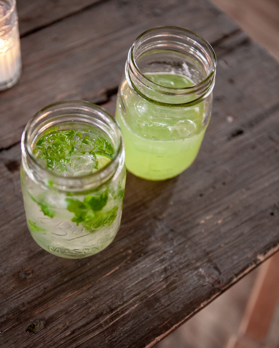 A cocktail being finished at the bar
