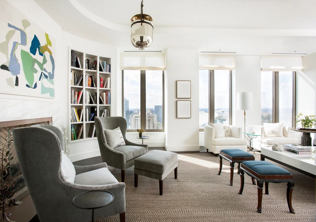 A suite sitting room with a sofa and armchairs